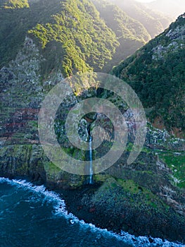 Beautiful view of cliffs and Corrego da Furna waterfall. Madeira, Portugal