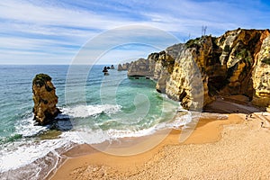 Beautiful view of the cliffs and the sea of Praia dos Estudiantes in Algarve, Portugal