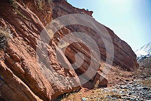 Beautiful view of cliffs from yellow red limestone. Kyrgyzstan