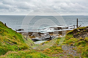 Beautiful view of the coast with the horizon over the sea on the coastal walk route