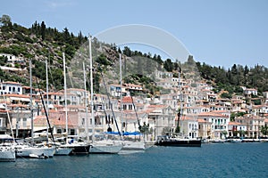 Beautiful view of coastal city with sailboats on sunny day