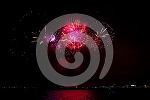 Beautiful view of colorful fireworks over the Lake Michigan near Chicago, IL in the night sky