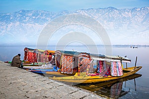 Beautiful view of the colorful Shikara boats floating on Dal Lake, Srinagar, Kashmir, India photo