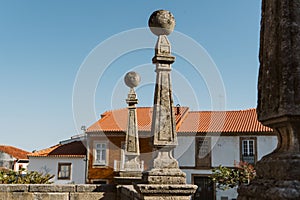 Columns of Torre de Moncorvo Castle with buildings around it in Portugal photo