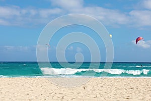 Beautiful view of Corralejo Dunas beach with kitesurfers, Fuerteventura, Canary Islands photo