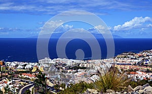 Beautiful view on Costa Adeje and Atlantic ocean with La Gomera island on the horizon in Tenerife,Canary Islands,Spain.