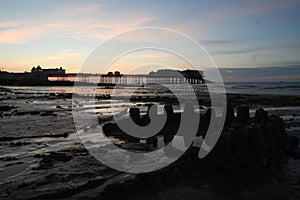 Beautiful view of the Cromer pier at sunset in Cromer, UK