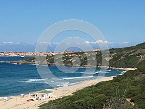 Beautiful view of the crystal clear sea of the coast of Sardinia near the red island