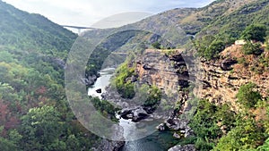 Beautiful view of the deepest Tara River Canyon surrounded by green forest with a Highway Bridge. Highway concrete bridge