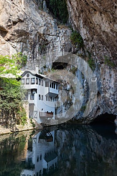 Beautiful view of the Dervish House under the rock in Blagaj. Bosnia and Herzegovina