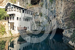 Beautiful view of the Dervish House under the rock in Blagaj. Bosnia and Herzegovina