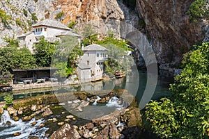 Beautiful view of the Dervish House under the rock in Blagaj. Bosnia and Herzegovina