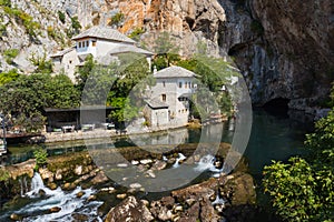 Beautiful view of the Dervish House under the rock in Blagaj. Bosnia and Herzegovina