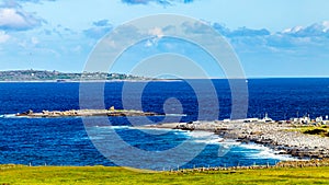 Beautiful view of Doolin pier, it`s bay and the small Crab island