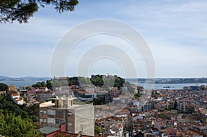 Beautiful view of the downtown of the city of Lisbon, with the Saint George Castle Castelo de Sao Jorge and the Tagus River on t
