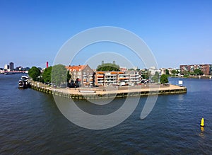 Beautiful view from Erasmus bridge on Nieuwe Maas river and Noordereiland island in Rotterdam, Netherlands