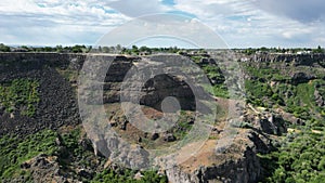 Beautiful view of an erosive geological formation with greenery photo