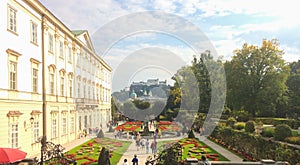 Beautiful view of famous Mirabell Gardens with the old historic Fortress Hohensalzburg in the background in Salzburg, Austria