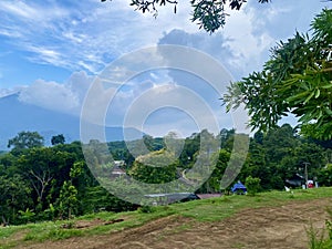 Beautiful view of farmland and trees in a mountain valley