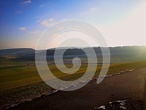 Beautiful view of the field and a mountain range of the mountains in Germany