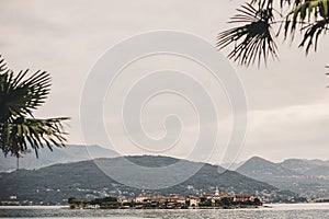 Beautiful view on Fisherman`s Island from Stresa, vacation in Italy. Isola dei Pescatori on Lago Maggiore in sunny day on