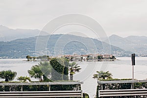 Beautiful view on Fisherman`s Island from Stresa, vacation in Italy. Isola dei Pescatori on Lago Maggiore in sunny day on