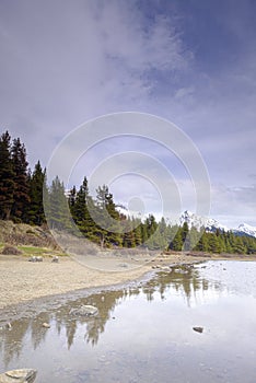 Beautiful view of frozen Maligne Lake in Jasper National Park