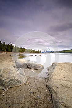 Beautiful view of frozen Maligne Lake in Jasper National Park