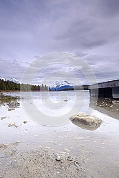 Beautiful view of frozen Maligne Lake in Jasper National Park