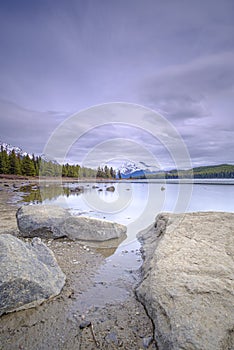 Beautiful view of frozen Maligne Lake in Jasper National Park