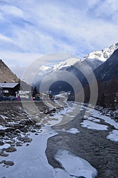 Icy river flowing through the Otztal Valley in Solden Alpine resort photo