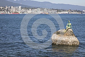 Beautiful view of the Girl in a Wetsuit in Stanley Park in Vancouver