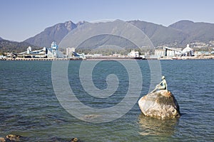 Beautiful view of the Girl in a Wetsuit in Stanley Park in Vancouver