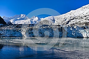 Beautiful view of the glaciated mountains and icefall with blue sky