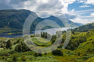 Beautiful view from the Glenfinnan Trail View Point on the Loch Shiel surrounded by mountains during sunny day in Glenfinnan