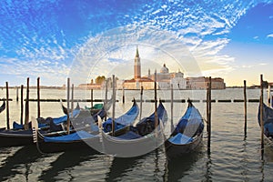 Beautiful view of the gondolas and the Cathedral of San Giorgio Maggiore, on an island in the Venetian lagoon, Venice, Italy