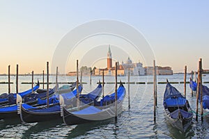 Beautiful view of the gondolas and the Cathedral of San Giorgio Maggiore, on an island in the Venetian lagoon, Venice, Italy