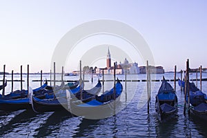 Beautiful view of the gondolas and the Cathedral of San Giorgio Maggiore, on an island in the Venetian lagoon, Venice, Italy