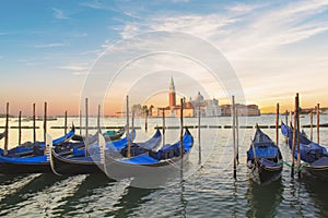 Beautiful view of the gondolas and the Cathedral of San Giorgio Maggiore, on an island in the Venetian lagoon, Venice, Italy