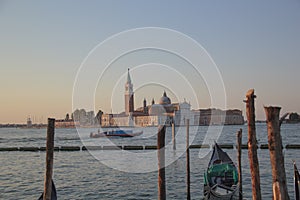 Beautiful view of the gondolas and the Cathedral of San Giorgio Maggiore, on an island in the Venetian lagoon, Venice, Italy