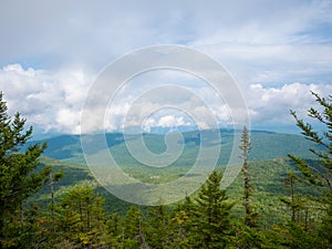 Beautiful view of the Green mountains from the top of a mountain in Vermont, during a summer day