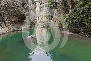 Beautiful view of the GuadalevÃ­n river between the canyon or Tajo de Ronda with its turquoise waters