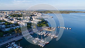 Beautiful view of harbor and boats. Helsinki city at sunset. Summer panorama.