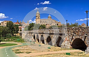 Beautiful view of the historic city of Salamanca with New Cathedral and Roman bridge, Castilla y Leon region, Spain. photo
