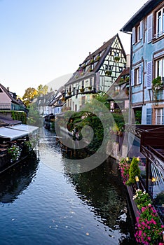 Beautiful view of the historic town of Colmar, also known as Little Venice, boat ride along traditional colorful houses on idyllic