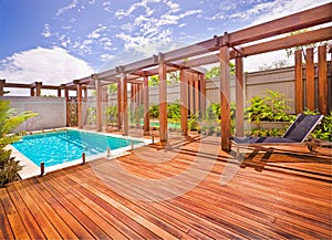 Beautiful view of a home from front with a pool