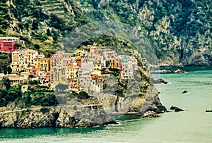 Beautiful view of the houses in Parco Nazionale delle Cinque Terre by the sea, Fornacchi, Italy photo
