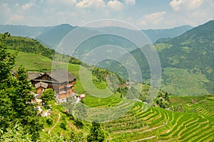 Beautiful view of the houses of the village of Dazhay, rice terraces and mountains.