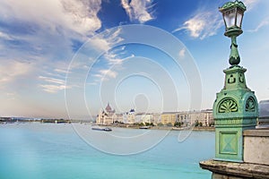 Beautiful view of the Hungarian Parliament on the Danube waterfront in Budapest, Hungary