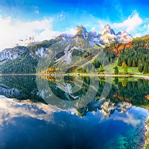 Beautiful view of idyllic colorful autumn scenery in Gosausee la